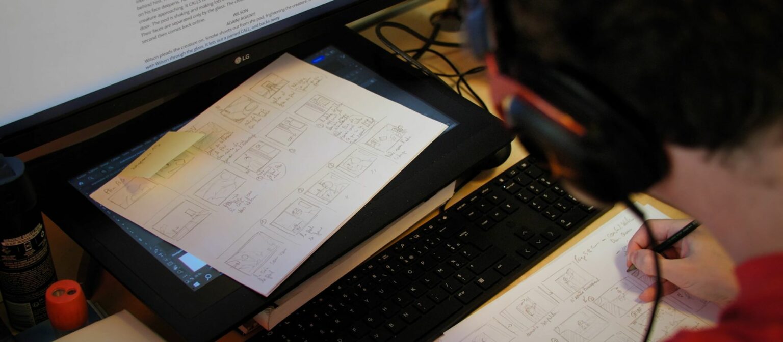 3D animation student working on character modeling in a creative workspace at ESMA